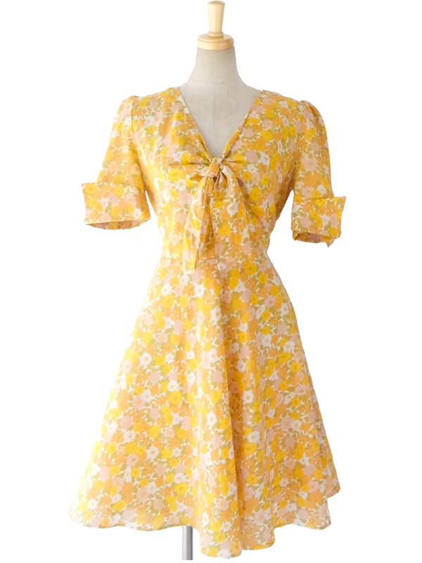 ヨーロッパ古着 ロンドン買い付け 60年代製 オレンジを基調としたきれいな色身の花柄 リボンタイ ヴィンテージ ワンピース 15BS208